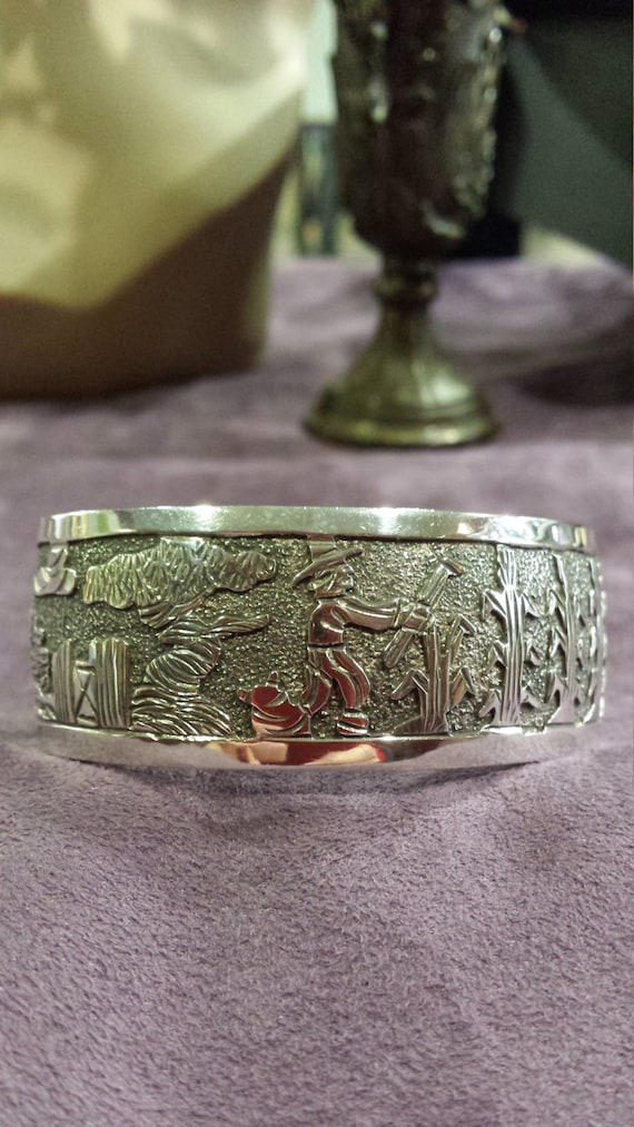 Sterling silver story teller cuff bracelet