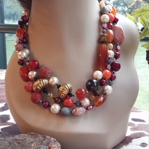 Three strand Semi-precious stone designer necklace made with carnelian, tiger eye, pearl, agate, sponge coral and more
