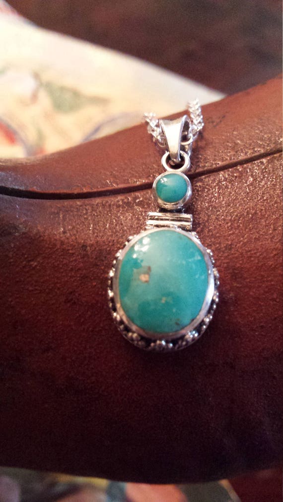 Sterling silver turquoise pendant with sterling si