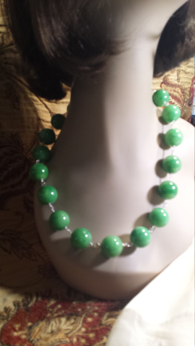 One strand beaded enhanced jade necklace