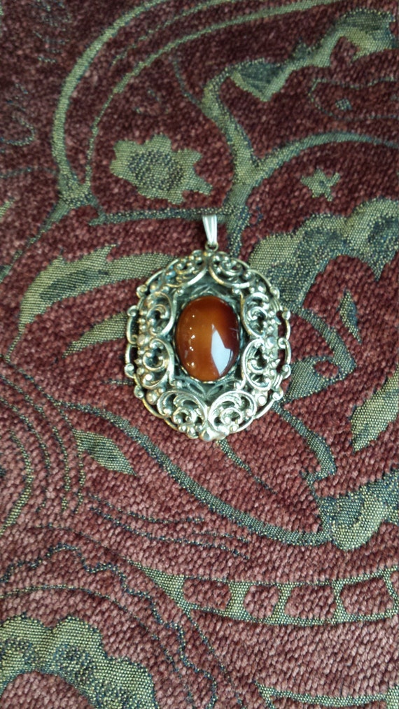 Vintage gold toned pendant