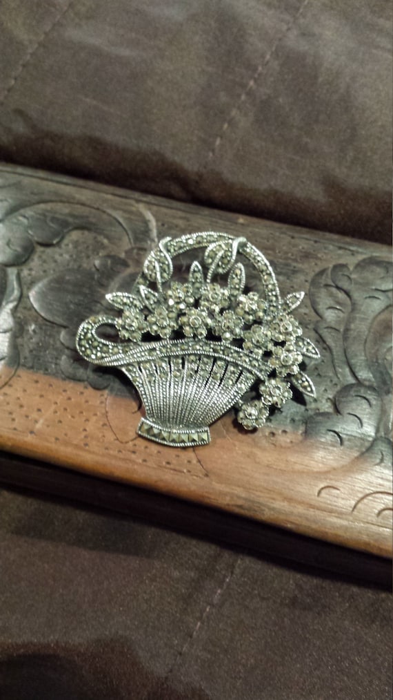 Sterling silver and marcasite basket with floral b
