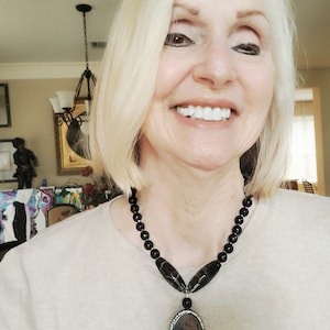 Black onyx pendant necklace with matching earrings