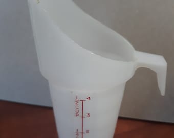 Vintage Merry Maid plastic measure cup scoop. 1/2 cup-4 oz. Clear red graphics