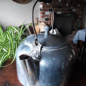 Vintage 5 quart  Priscilla Ware metal tea coffee kettle with black wooden handle with lid. Ornate décor, farmhouse, country, primitive. USA