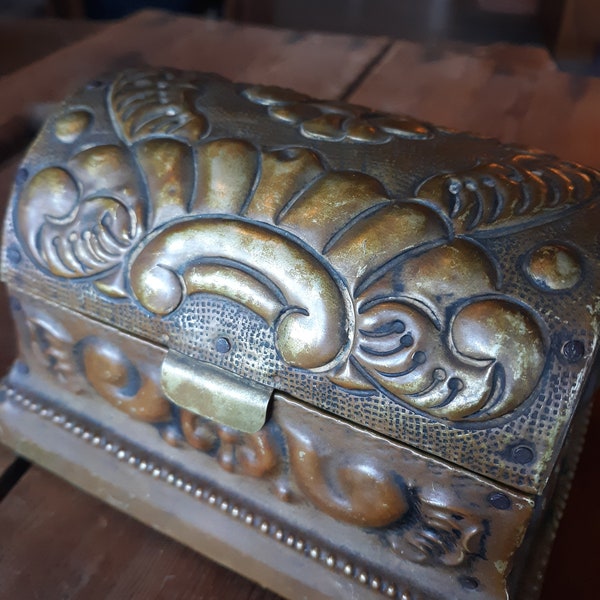 Vintage ornate metal trinkit box chest detailed.