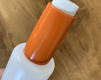Vintage Tupperware rolling pin, fill and chill rolling pin. Brunt Orange handles.