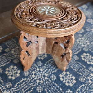 Vintage ornate decorative teak wood carved small table, plant stand, riser, inlaid flower design, boho, morracan, decorative statement piece
