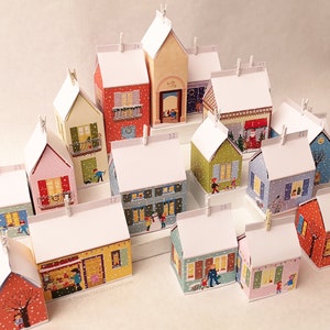 Printable village Advent calendar with various house-shaped boxes. Easy to make. A4 and USLetter.