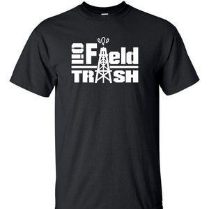 May include: Black t-shirt with white text that reads "Oil Field Trash" and a graphic of an oil rig.