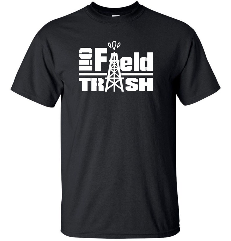 May include: Black t-shirt with white text that reads "Oil Field Trash" and a graphic of an oil rig.