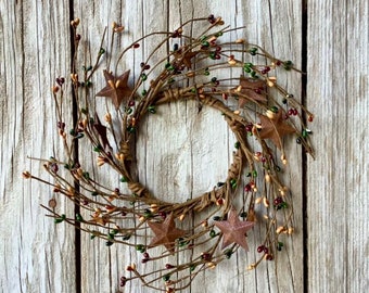 Pip Berry Candle Ring with Green, Mustard and Burgundy Berries and Rusty Stars