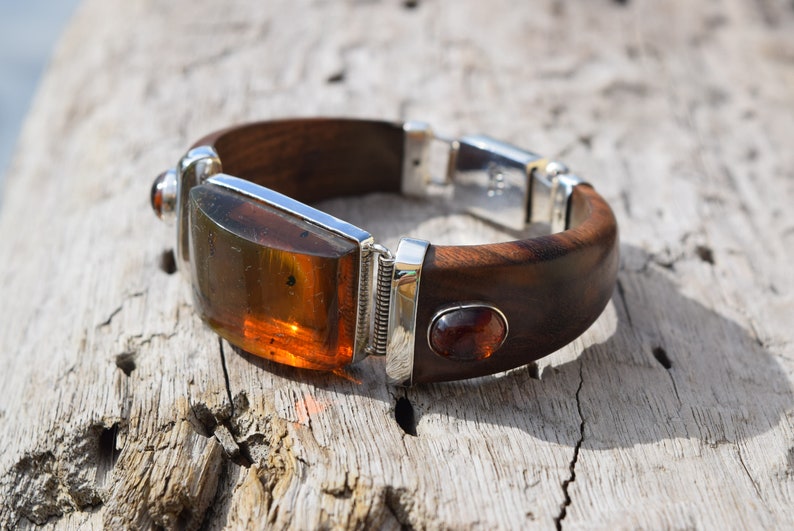 Fine Caribbean Wooden bracelet with big Natural Yellow amber Cab and little red amber cabs set in .925 Sterling Silver handmade.
