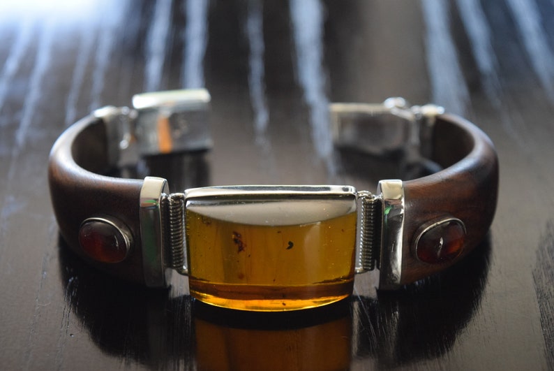 Fine Caribbean Wooden bracelet with big Natural Yellow amber Cab and little red amber cabs set in .925 Sterling Silver handmade.