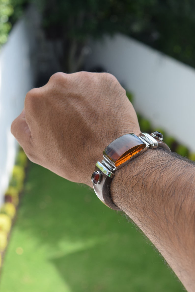 Fine Caribbean Wooden bracelet with big Natural Yellow amber Cab and little red amber cabs set in .925 Sterling Silver handmade.