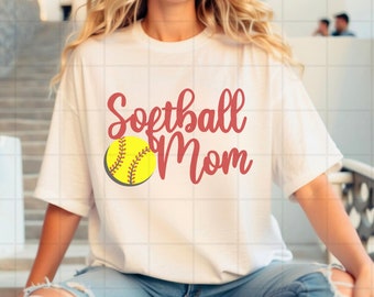 May include: White t-shirt with the text "Softball Mom" in red lettering and a yellow softball with red stitching.