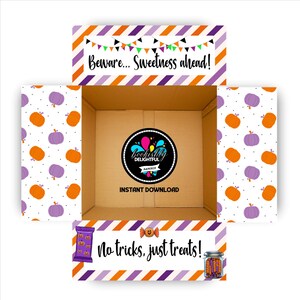 May include: Open cardboard box with Halloween-themed decorations. The box features orange and purple pumpkins, diagonal stripes, and text that reads "Beware... Sweetness ahead!" and "No tricks, just treats!" A circular logo is in the center.