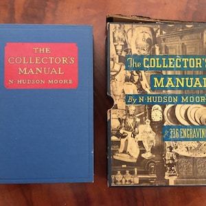 May include: Two vintage books titled "The Collector's Manual" by N. Hudson Moore. The book on the left has a blue cover with a red label. The book on the right has a decorative cover with the text "336 Engravings".