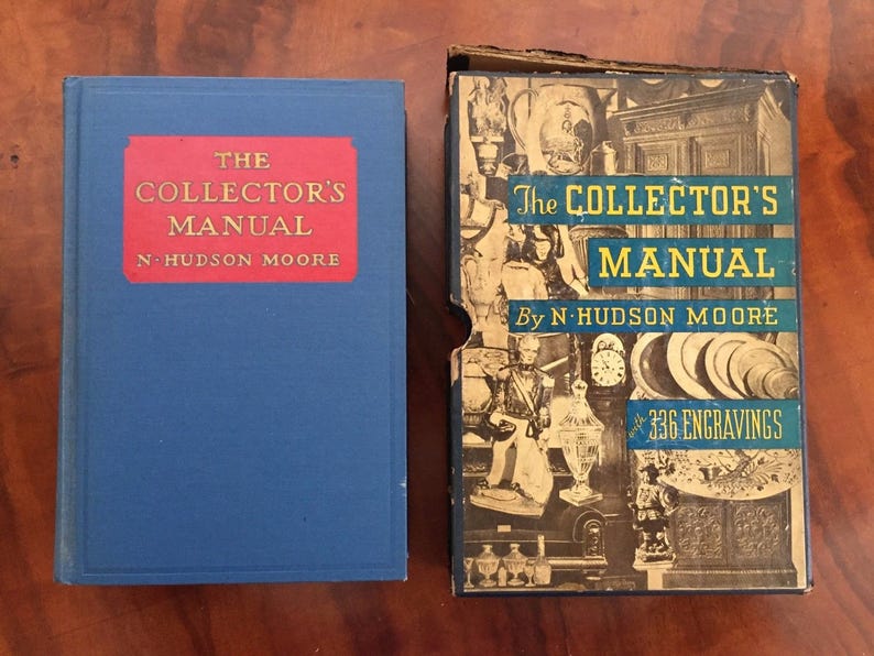 May include: Two vintage books titled "The Collector's Manual" by N. Hudson Moore. The book on the left has a blue cover with a red label. The book on the right has a decorative cover with the text "336 Engravings".