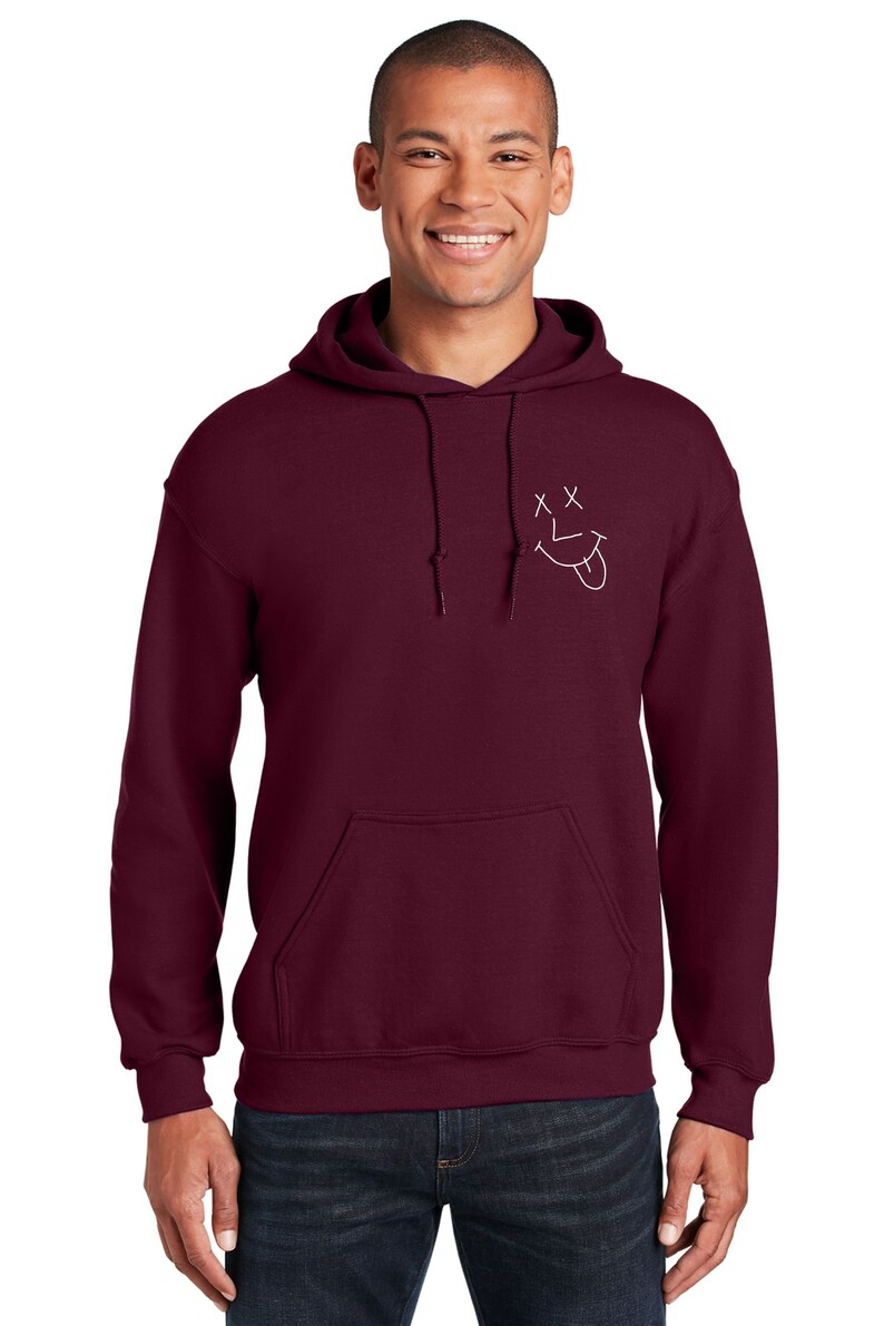 brown hoodie with smiley face