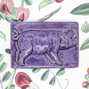 Ceramic tile &quot;Pig&quot; – Handmade relief tile in vibrant violet