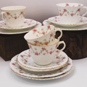 Antique Crown Staffordshire demitasse cup with saucer cabinet display collector bone china floral pink pattern