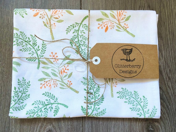 Hand Printed Autumn Leaves Cotton Tea Towel, Moss Green and Orange