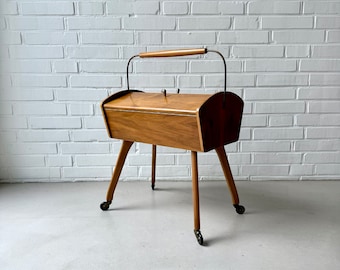 Vintage sewing box on legs, teak sewing box on wheels, mid century sewing table, sewing basket