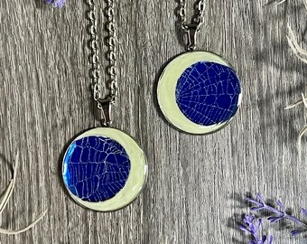 Preserved Spiderweb Crescent Moon Pendant Necklace: Glow in the Dark Blue Moon