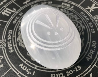 Engraved Selenite Crystal Palm Stone Awen symbol