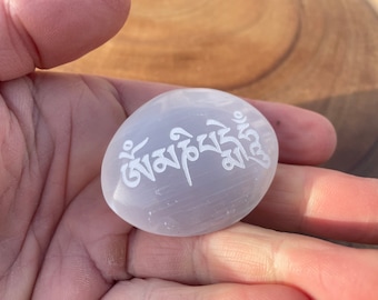 Om mani padme hum engraved onto Pure Selenite Crystal Palm Stone