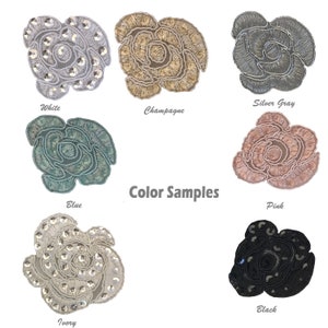 May include: Color samples of embroidered rose appliques in white, champagne, silver gray, blue, pink, ivory, and black.
