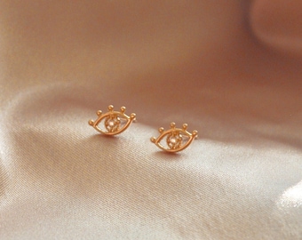 14K Evil Eye Diamond stud earrings. Solid gold. Fine jewelry. Protection talisman amulet symbol. Mediterranean symbols. Sparkling diamonds.