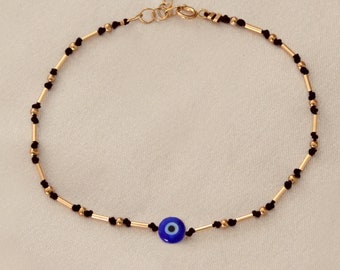 Evil Eye 14kt gold filled Armband. Naturseide Strang. Schutzamulett, Talisman. Nazar, Glück. Rote Schnur. Schwarz und Gold. Perlen