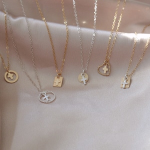 Dainty Cross necklaces. 14kt gold filled and sterling silver. Tiny elegant crosses. Sparkling chain. Delicate cross necklace. Micro cross