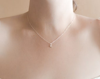 Crescent moon necklace. sterling silver. sparkling necklace with tiny plump moon. clair de lune. moonlight necklace. moon phase jewelry.