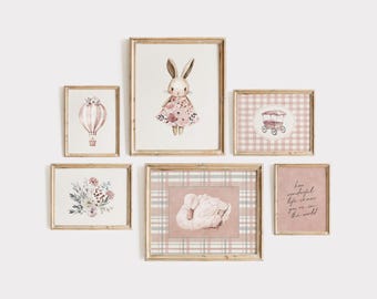 May include: A collection of framed watercolor art prints in a nursery theme. The prints feature a bunny in a floral dress, a hot air balloon, a swan, a floral arrangement, a carriage, and the text "How wonderful life is now you're in the world."