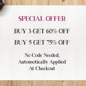May include: A white paper with the text "SPECIAL OFFER" in purple. The text below reads "BUY 3 GET 60% OFF" and "BUY 5 GET 75% OFF". The text "No Code Needed. Automatically Applied At Checkout" is also present. The paper is on a wooden surface.