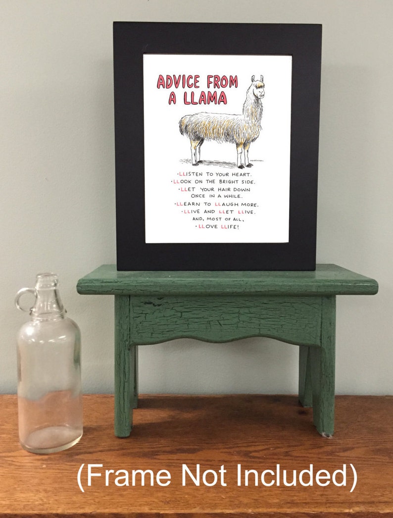 May include: A framed print with a black frame and a white background. The print features a cartoon llama with the text "Advice from a Llama" and a list of advice in red text: "Listen to your heart. Look on the bright side. Let your hair down once in a while. Learn to laugh more. Live and let live, and, most of all, love life!"