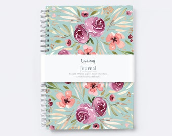 Dot grid journal with a soft blue floral cover. 2021 Daily or weekly planner that is wire bound with 200 Dot Grid Pages.