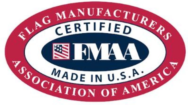 May include: Red, white, and blue oval logo with the text "FLAG MANUFACTURERS ASSOCIATION OF AMERICA" around the outside. Inside the oval is a smaller blue oval with the text "CERTIFIED" above the text "FMAA" and the text "MADE IN U.S.A." below. A small American flag is in the upper left corner of the smaller oval.