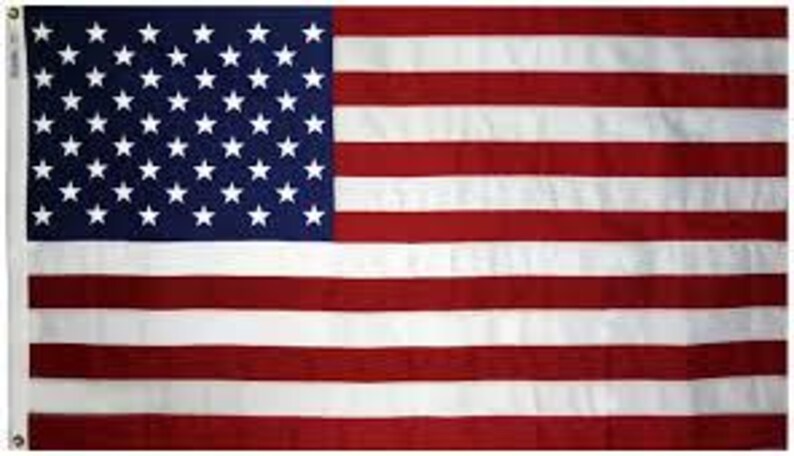 May include: A red, white, and blue American flag with 50 white stars on a blue field and 13 alternating red and white stripes.