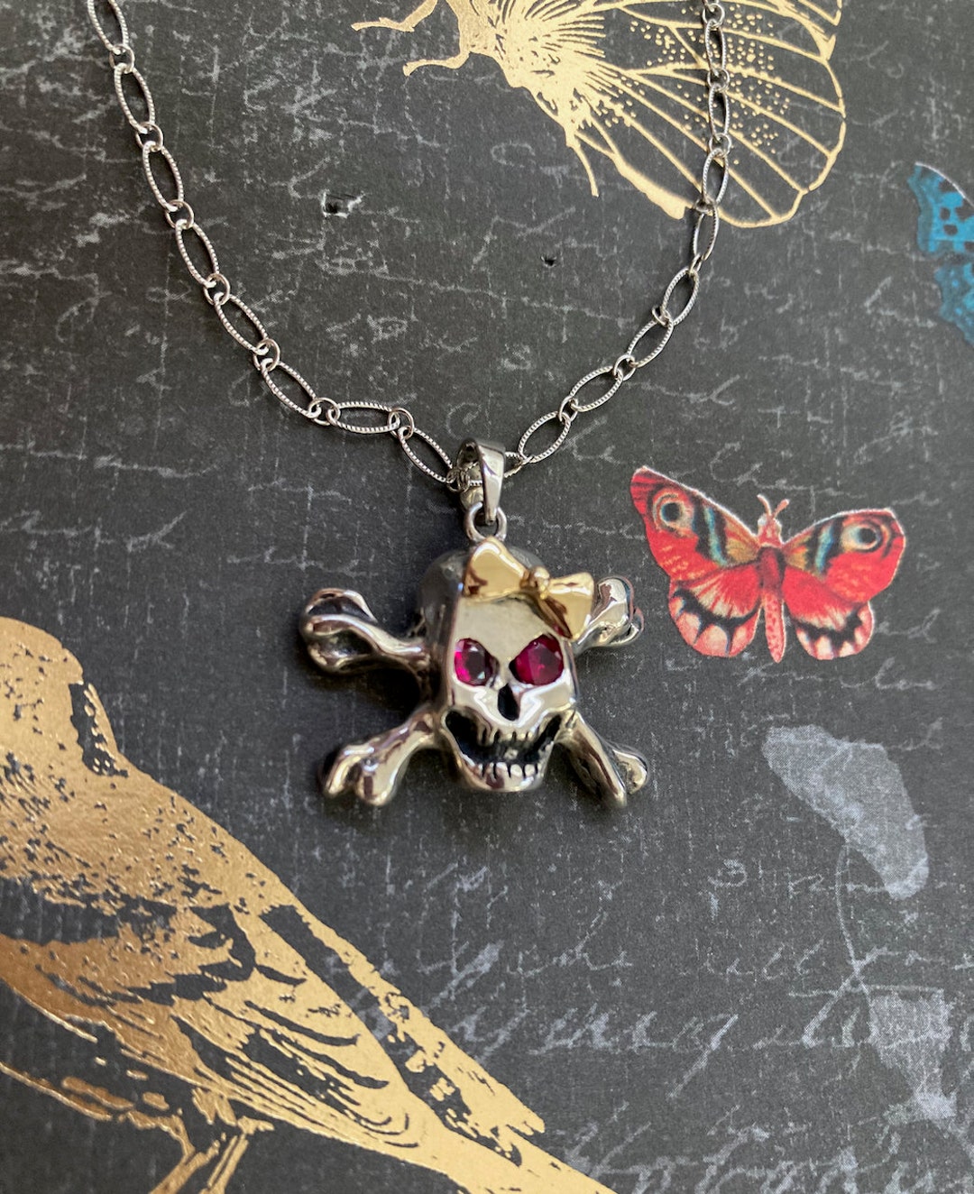 Hello Skully Skull Pendant With Ruby Eyes in Sterling Silver Hello Skully Skull Pendant With Ruby Eyes in Sterling Silver