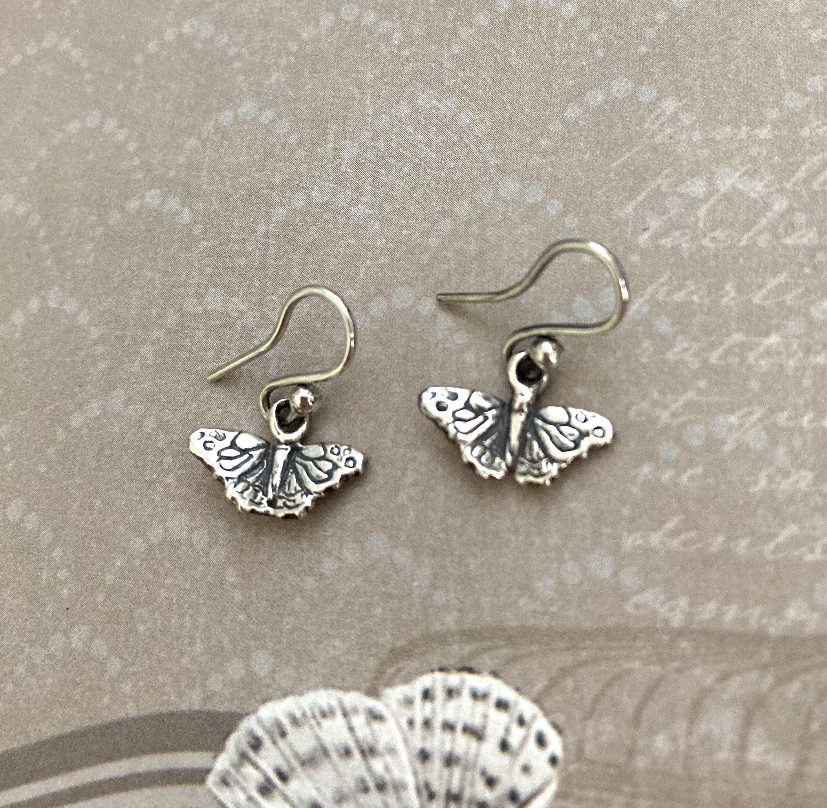 Yheakne Boho Butterfly Ear Jacket Earrings White Enamel Butterfly Stud  Earrings Acrylic Butterfly Drop Earrings Vintage Double Butterfly Earrings  Jewelry for Women and Girls : Amazon.co.uk: Fashion