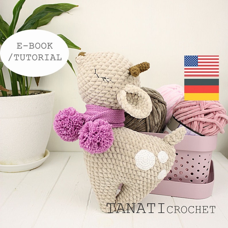 May include: Crochet pattern for a fawn amigurumi toy with a pink scarf and pom poms. The pattern is available in English and German. E-book / Tutorial.