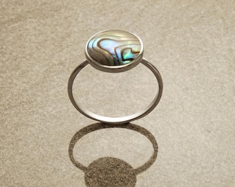 Round abalone ring, sterling silver set with genuine paua shell in a modern geometric stone design