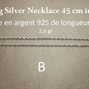Può includere: Collana in argento sterling, lunga 45 cm, con un peso di 2,6 grammi. La catena è in argento sterling 925.  "Chaîne en argent 925 de longueur 45 cm 2,6 gr"