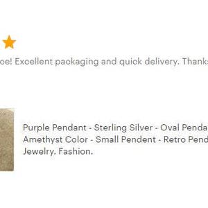 May include: A purple oval pendant necklace made of sterling silver. The pendant is small and has a retro style. The pendant is on a white background.