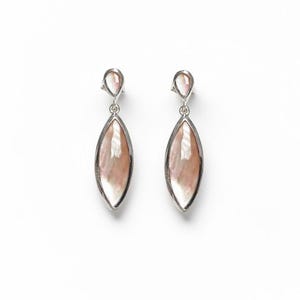 May include: A pair of drop earrings featuring marquise-shaped iridescent shell inlays set in polished silver-tone metal. Each earring consists of a small teardrop-shaped top piece connected to a larger, elongated marquise-shaped bottom section.