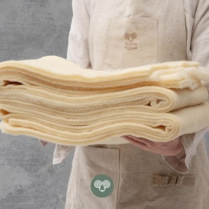 Guata de lana 100 % orgánica, cortada a medida, con certificación GOTS, perfecta para decoración, manualidades, tapicería y aislamiento.